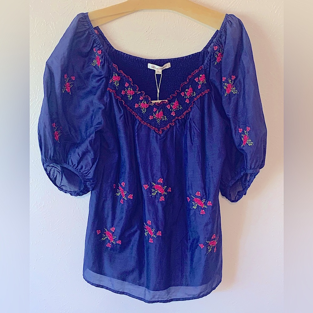 Amazing deep blue top with delicate embroidered pink flowers. NWT. XL.